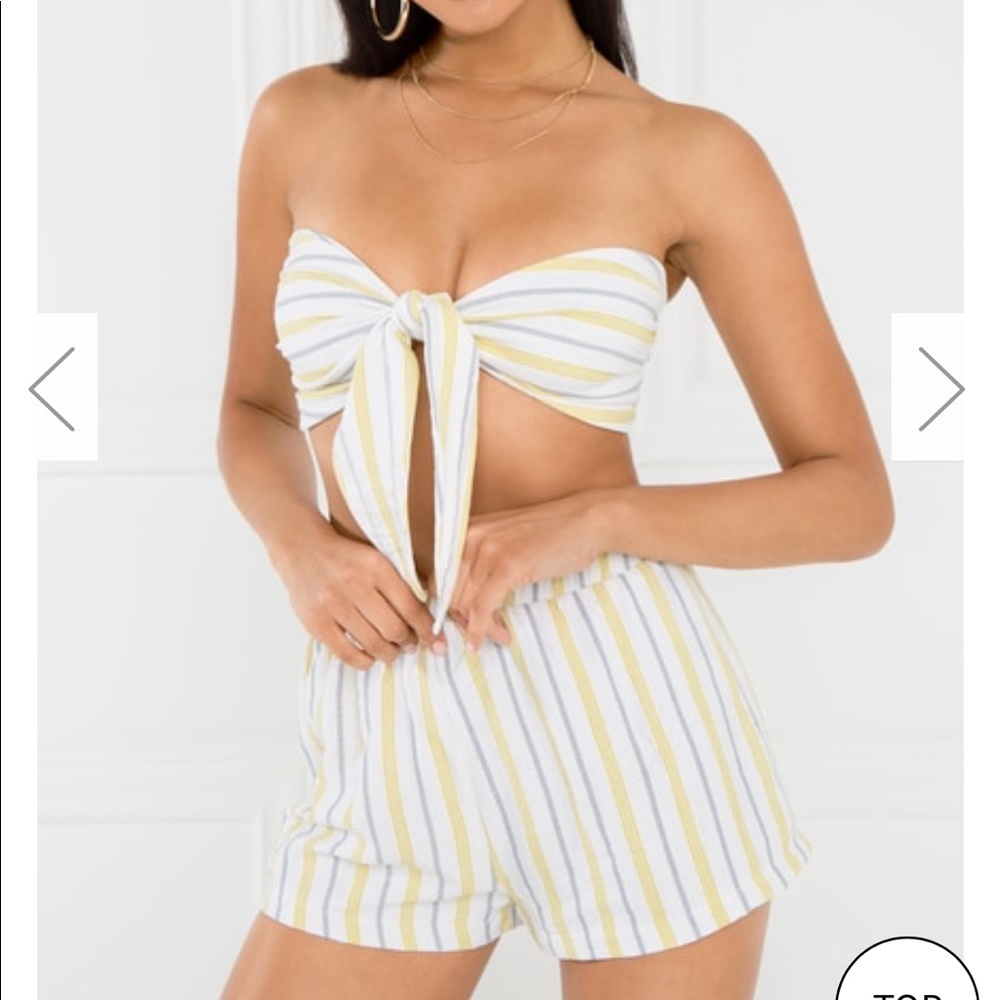 Two piece set. Knotted top with shorts.